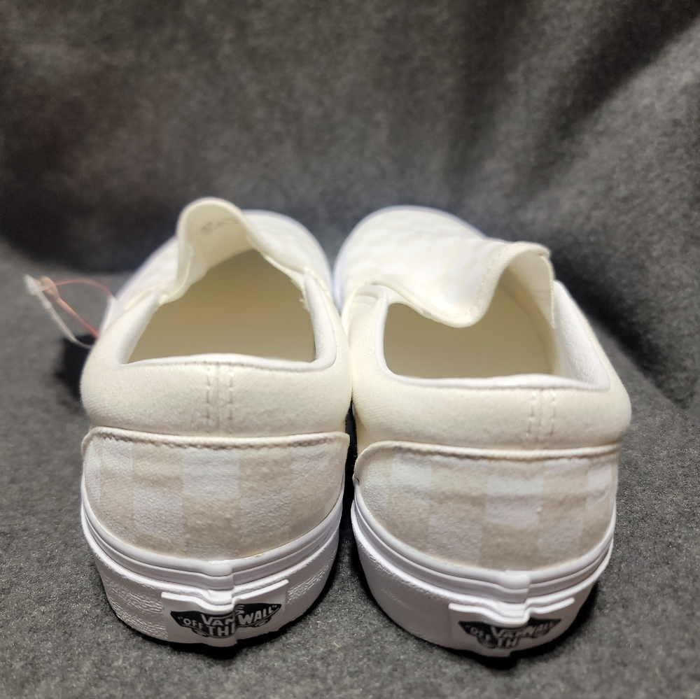 Vans Slip-On Skate shoe in a white color with a reflective checkerboard pattern. - Picture 4 of 5
